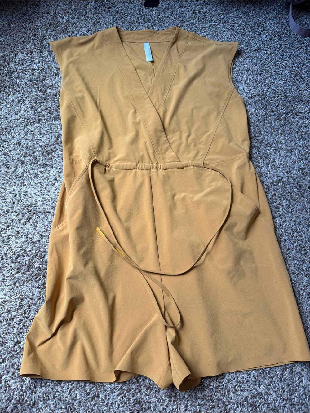 Athleta Sleeveless Wrap Romper in Mustard